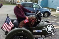 John Bencken of Kerrville Texas and his chocolate Labrador Service Dog (and best friend) Suzie at the Legion.