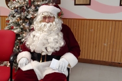 Santa Claus, sitting in his chair, after handing out gifts at the American Legion Family Children’s Christmas Party.  Thank you Santa and Mrs. Claus!!!!